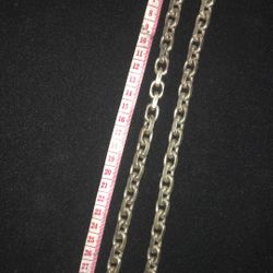 Silver necklace but, made in the