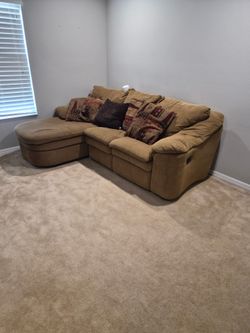 Couch with chaise lounge and recliner.