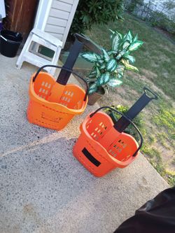 Two plastic container on wheels