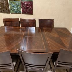 (ON HOLD) Brown Wood Dining Table Hidden Leaf Seats 4 To 6 To 8
