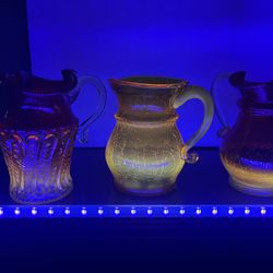Glowing glass pitchers