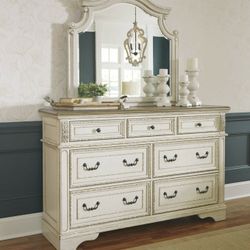 Realyn Chipped White Dresser