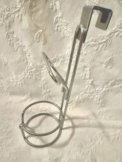 Over cabinet hair dryer rack