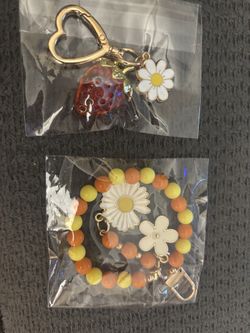 New set of daisy and strawberry keychains sold as set