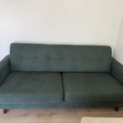 Green mid-century modern sofa