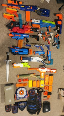 Huge Nerf lot with jackets, goggles, tons of darts, plus x shot as well