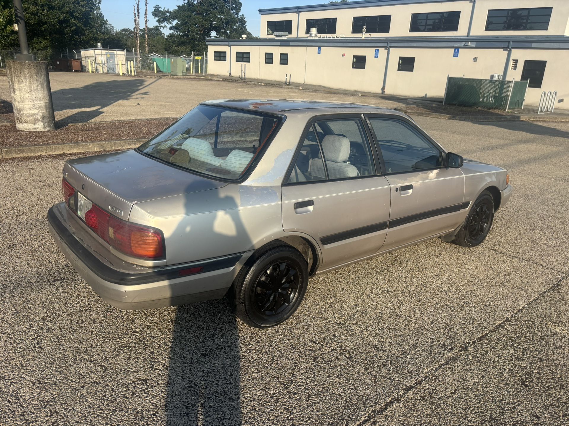 92 Mazda 4dr. Stick.  