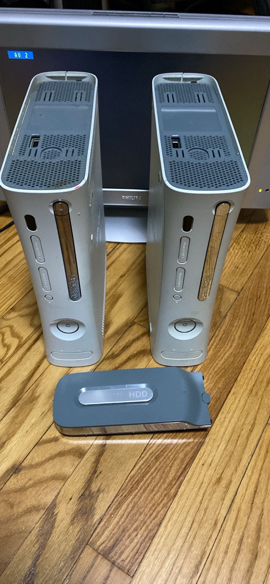 2-Xbox 360’s for parts, not workin. Powers on +HDD console only … no wires! 