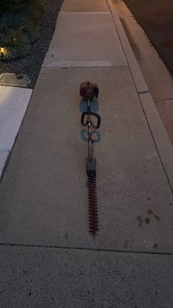 Gas toro trimmer with hedger attachment