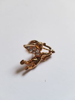 Small brass cupid pin/brooch