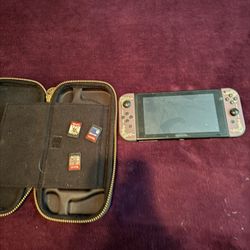 Nintendo Switch Console with Joy Cons and 4 games. 