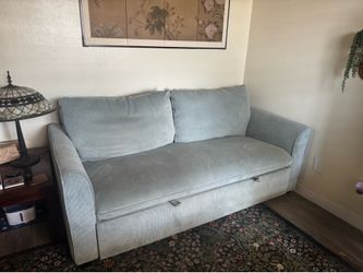 Convertible Green Sofa