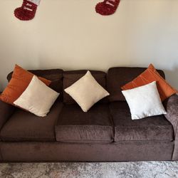 2 sofas brown