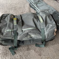 Dakine Large Luggage With Pull Out Handle And Wheels