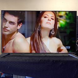 75 Inch TCL QLED Roku 4k Smart Beautiful Tv Comes With Remote Control Shows Great Quality Clear Picture Works Perfect Guaranteed 