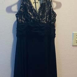 Black lace midi dress with bow detail, ideal for a special occasion #GothicGlamour #LaceDress #size 8