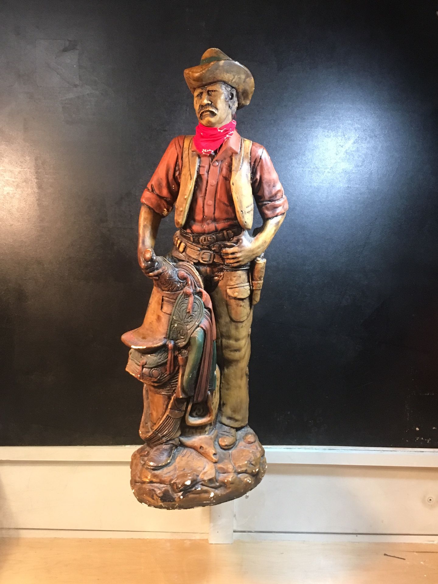 Ceramic Mexican cowboy statue.