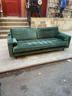 Green velvet sofa