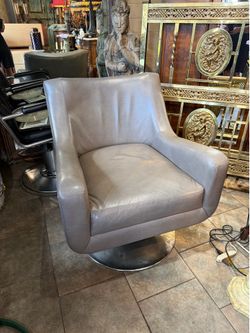 Antique leather swivel Club Chair