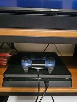 PS4 Slim Console with 4 Controllers and games