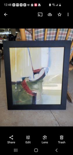 2 signed Erin Carter in black wood Frame some scratches on frame 22 by 25 $10 each