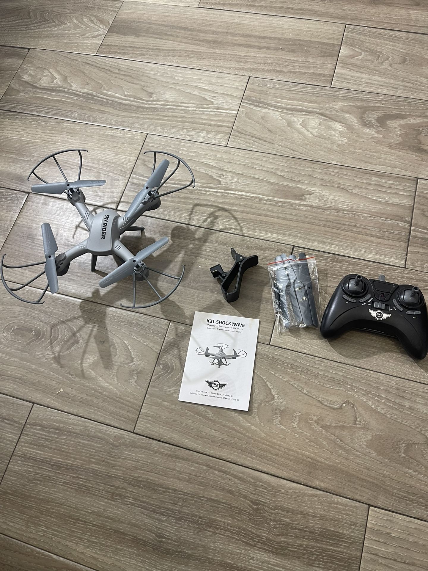 SkyRider Drone with Controller + Extra Parts