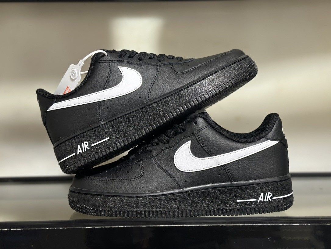 A pair of black Nike shoes
