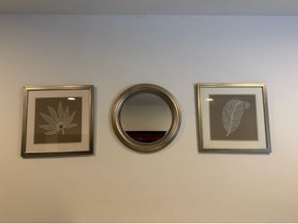 Set of wall hangings, one mirror and two pieces of framed art