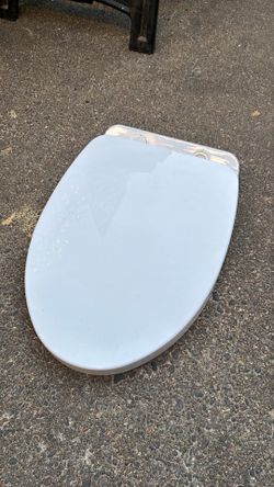 Free Toto toilet seat white.