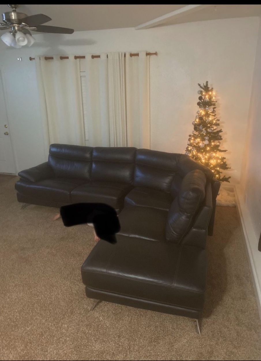Black leather sectional sofa