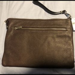 Barney’s Brown Leather Bag $100-