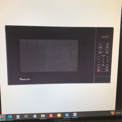 Magic Chef 1.1 Cu. ft. Countertop Microwave In Black With Gray Cavity