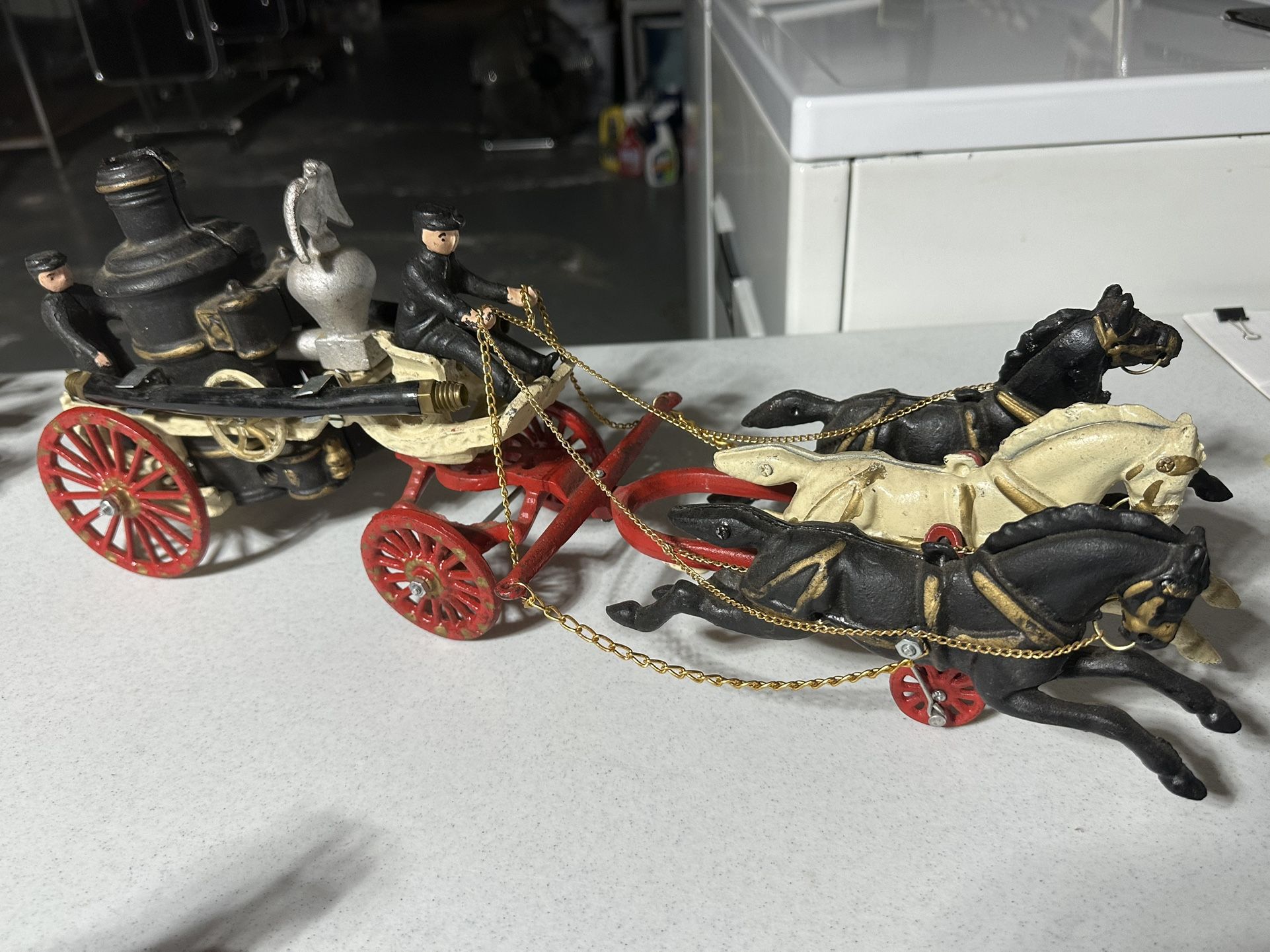 CAST IRON TOY FIRE TRUCKS