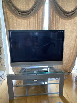 Panasonic 52 inch Plasma TV with modern stand