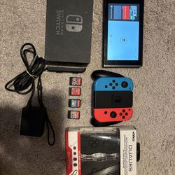 Nintendo Switch + 4 Games (hablo Espanol)