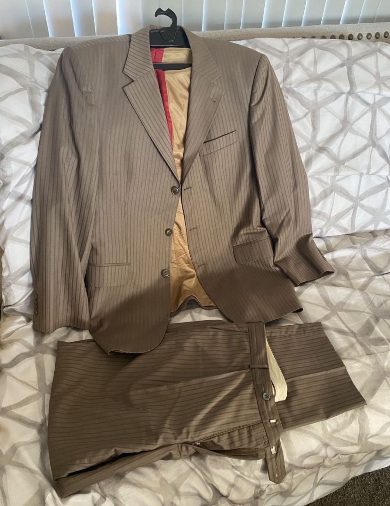 full suit (pants and jacket) X large size. Fits most adults