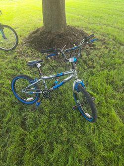 Boys bike with pegs