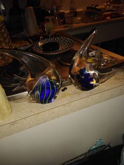 Solid glass fish statues