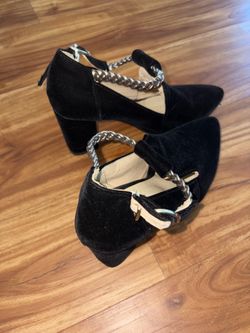 Black pointy suede heels