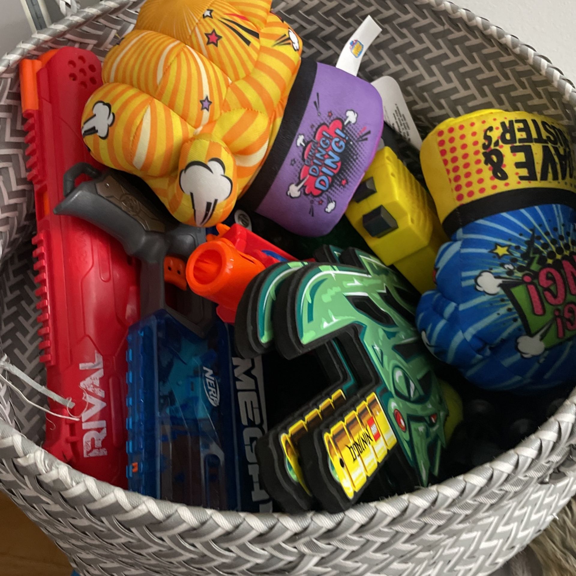 Basket With Nerf Guns And Toys For Children 