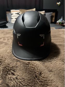 Black Easton baseball helmet