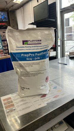 Trowelable flooring underlayment