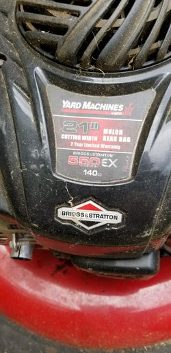 Briggs Stratton mower with bagger and seeder