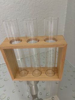 Glass vase in wooden box