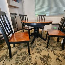 Darling 42" round kitchen Table with 4 chairs.  No leaf. 