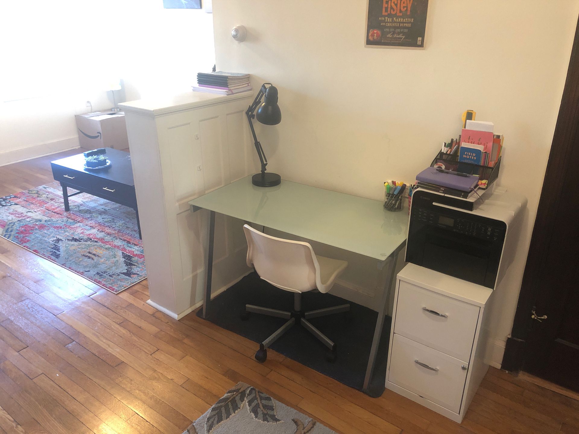 Desk and white filing cabinet