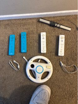 2 motion plus 2 regular remotes Wii motes