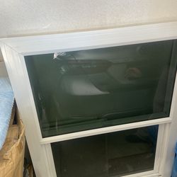 44 1/2 x 34 3/4 xo window with grey tint and Silicon