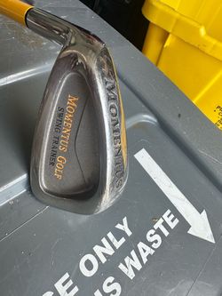 Golf club swing trainer