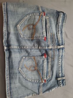 Y2K distressed denim mini skirt